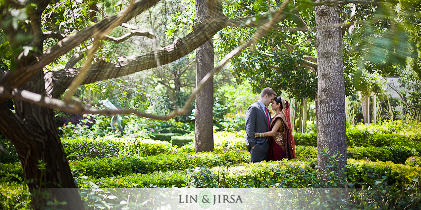 The beautiful wedding location is surrounded by green trees and lush 