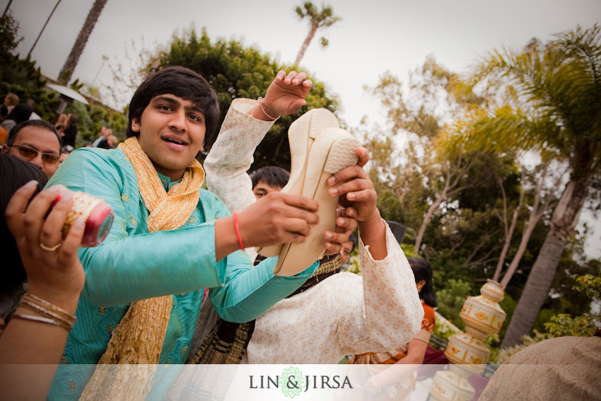  emerging from the battle for the shoes 5indianweddingnewportbeach