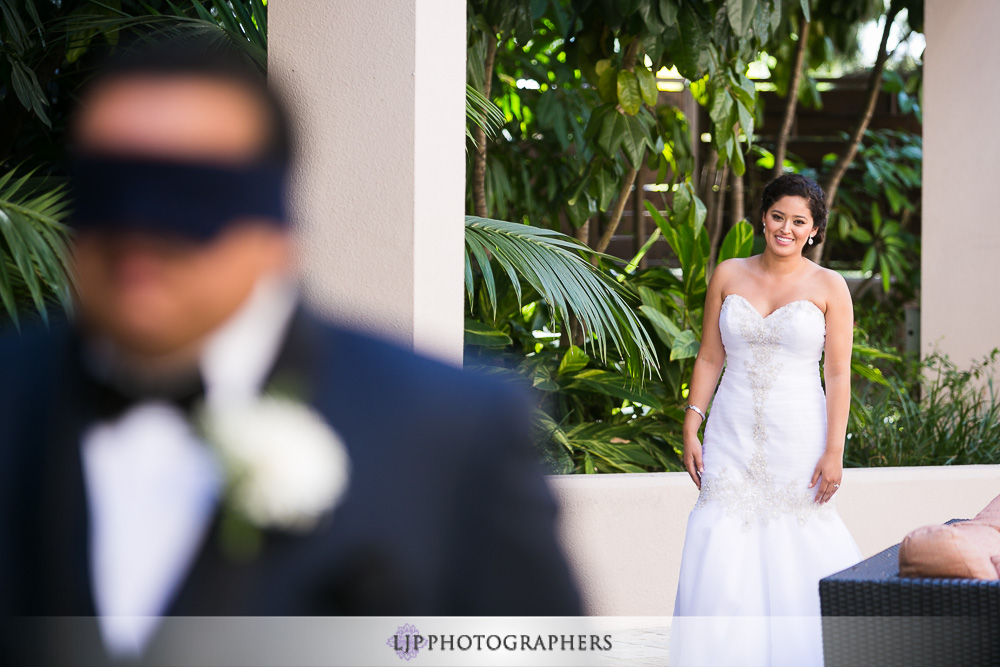 15-hilton-orange-county-costa-mesa-wedding-photographer-first-look-photos