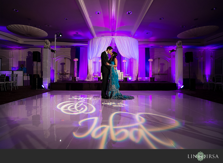 12-hilton-irvine-wedding-photographer-bride-and-groom-portraits-on-the-dance-floor