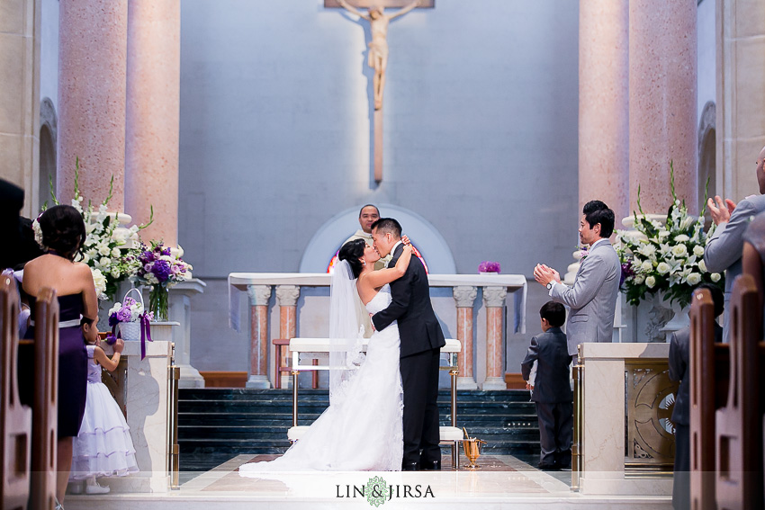 15-manchester-grand-hyatt-san-diego-wedding-photographer-bride-and-groom-first-kiss