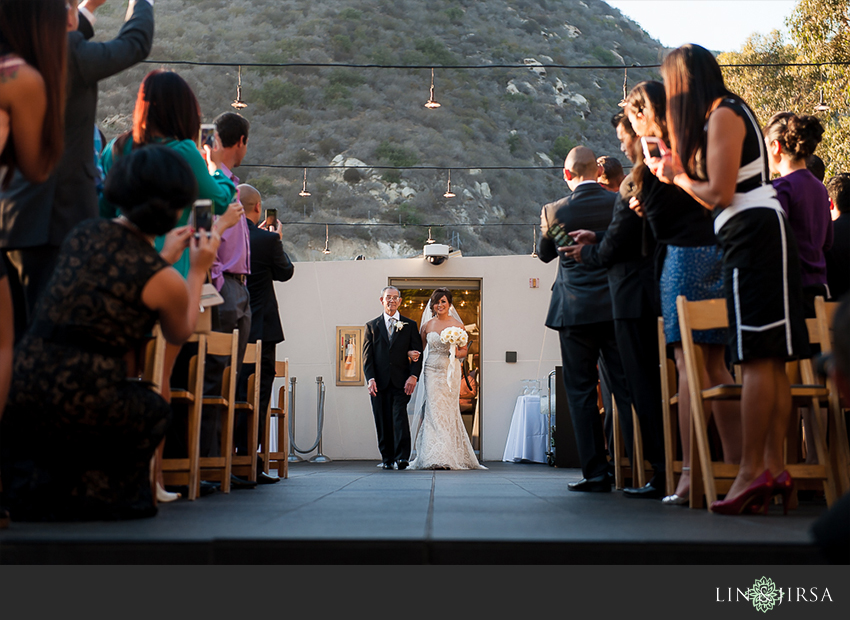 15-seven-degrees-laguna-beach-wedding-photographer-bride-walking-down-center-aisle