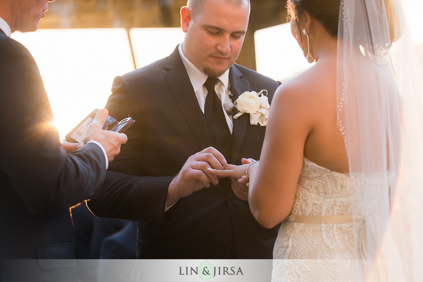 18-seven-degrees-laguna-beach-wedding-photographer-ring-exchange