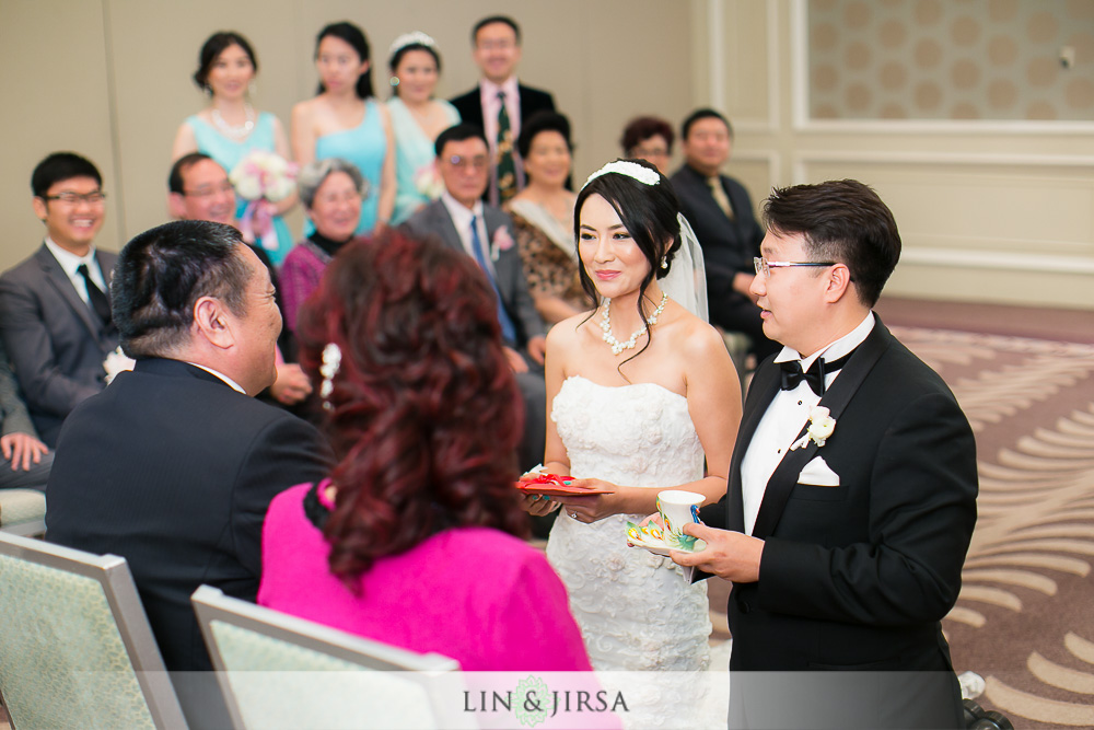11-the-ritz-carlton-laguna-niguel-wedding-photographer-tea-ceremony-wedding-ceremony-photos